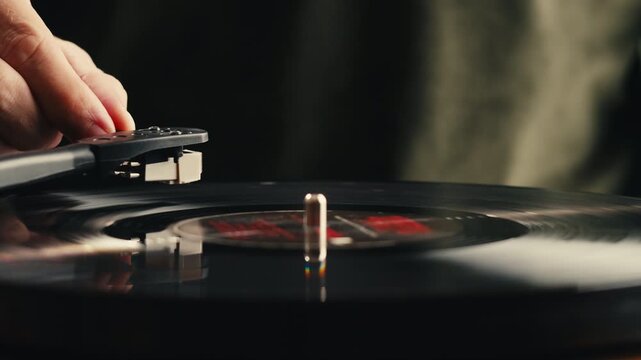 Retro Vinyl record player playing music, needle close-up macro shot of vintage LP disc old phonograph spinning. Retro music player at home.