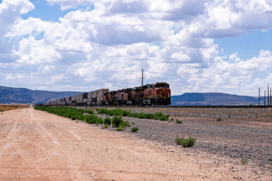 NM Highway 47 crossing 7-12-2026 Belen NM USAWeast bound BNSF stack train at the NM Highway 47 crossing headed for Belen, New Mexico on the BNSF Clovis Sub
