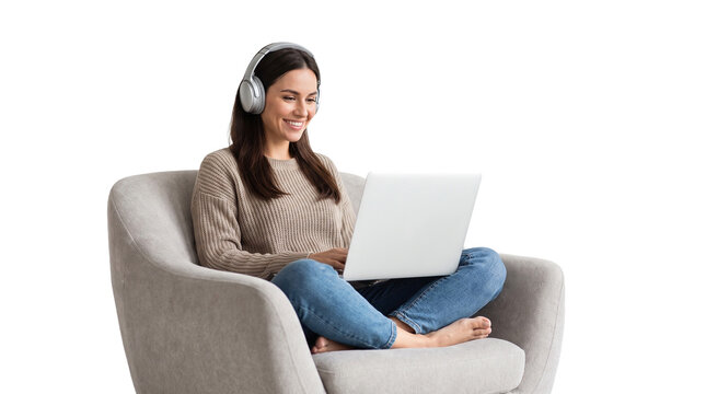 Woman with laptop and headphones. Freelancer sitting in chair using computer.