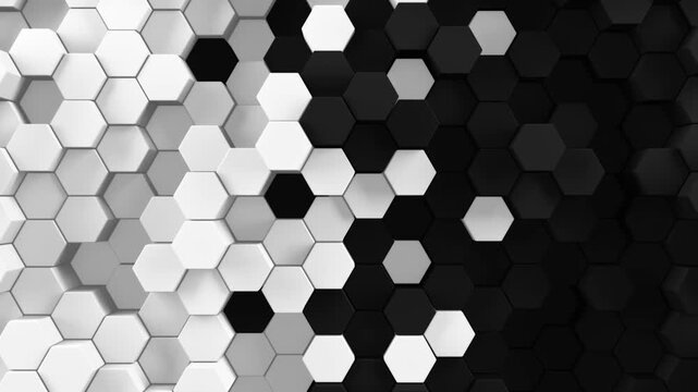 Black and white background of patterned hexagons. Smooth moving 3d rendered hex shapes creating a visual of sleek elegant motion for futuristic scientific or technical backgrounds. 3d render loop.