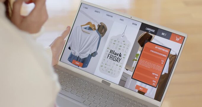 Female holding laptop in lap, seeing Black Friday tag, tapping My Shopping Bag, reviewing items