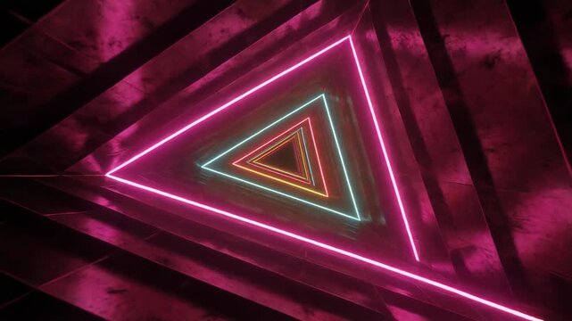 Neon triangle light installation in a dark room.