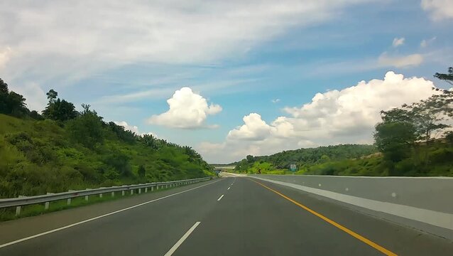 Car driving on highway road point of view