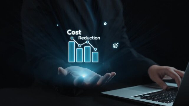 A businessman highlights cost reduction strategies with digital analytics and graphs, showcasing a modern approach to financial management and business efficiency. Qubit