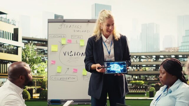Businesswoman presenting artificial intelligence implementation with tablet, action plan with AI neural networks system during informal workshop.