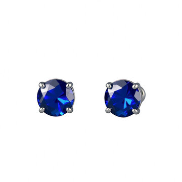 Pair of blue sapphire stud earrings isolated on black