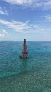Flying towards Sombrero Key Reef Lighthouse near Marathon in the Florida Keys.