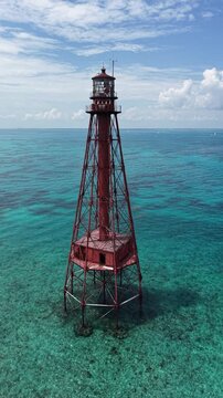 Circling around Sombrero Key Reef Lighthouse near Marathon in the Florida Keys.