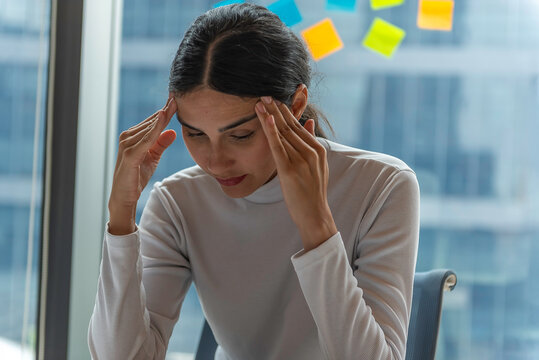 businessman being depressed by working in office.