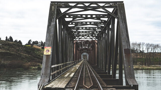 railway bridge rusty grey dark balclutha train tracks old unkept depressing