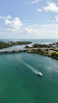 Aerial view of a fishing boat navigating the Vaca Cut channel at Marathon in Florida Keys. 