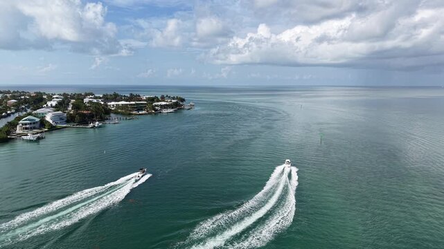 Aerial view of fishing boats headed to the Atlantic Ocean from the Vaca Cut channel at Marathon in Florida Keys. 