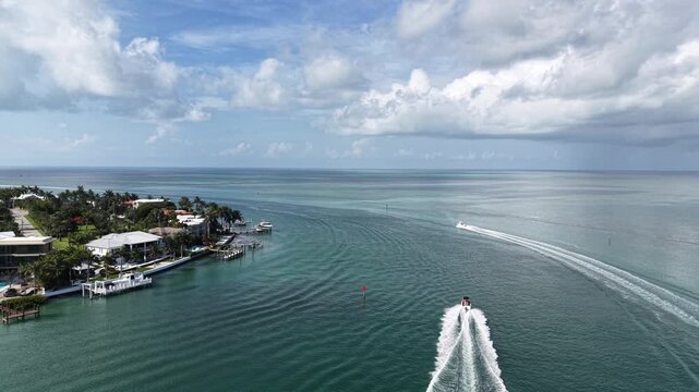 Aerial view of fishing boats headed to the Atlantic Ocean from the Vaca Cut channel at Marathon in Florida Keys. 