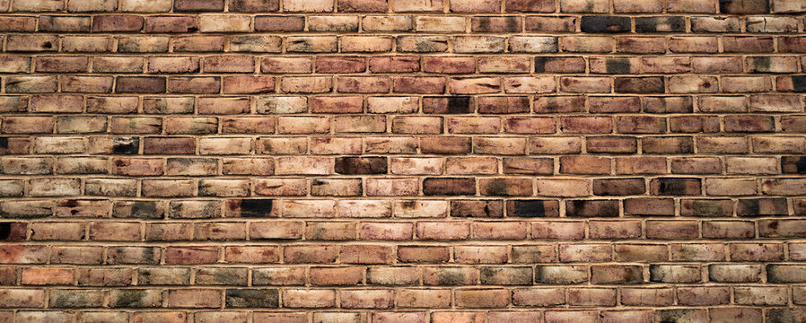 Brick wall made with bricks. Old red brick wall, masonry wall, stonework. Brickwall background texture. Textured background of brickwall. Clinker brick. Brick background. Grunge, wall pattern.