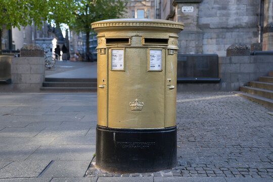 Edinburgh,UK - May 10, 2026: Sir Chris Hoy Gold Post Box in Hunter Square