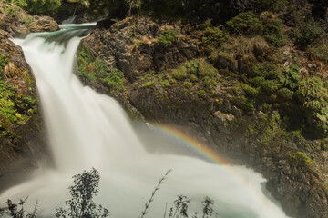 Long Exposure Waterfall with Rainbow in Native Forest, Patagonia, Argentina © santiago