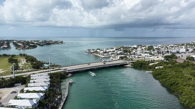 Aerial view of a fishing boat heading from the Atlantic to the Gulf through the Vaca Cut channel at Marathon in Florida Keys