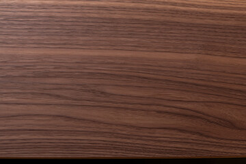 Naklejka premium Dark brown wood grain texture with horizontal lines and smooth surface, seamless background for design and wallpaper