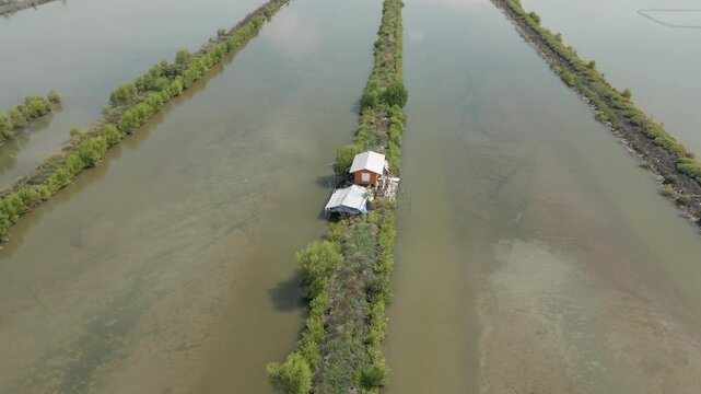 Farming Shack In Middle Of Mangrove Salt Field Bang Khun Thian Drone Circling 4K 60FPS