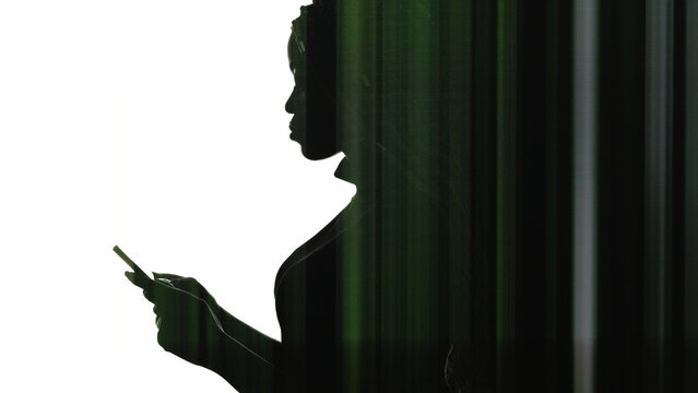 Mobile anxiety. Online stress. Double exposure glitch woman silhouette using phone texting message isolated on white copy space.