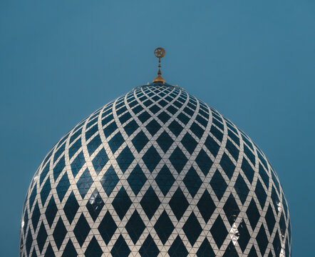 Mosque Dome with Geometric Pattern and Crescent Moon Finial