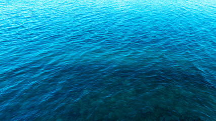 Fototapeta premium Top view of deep blue sea water surface with small ripples, aerial drone shot of turquoise ocean texture at island , abstract nature background 