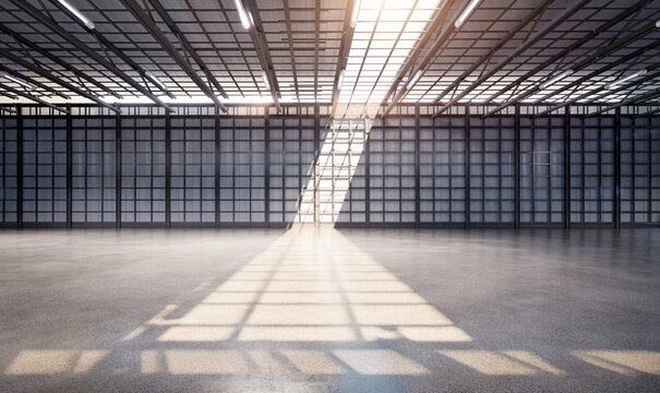 Empty factory interior filled with natural light