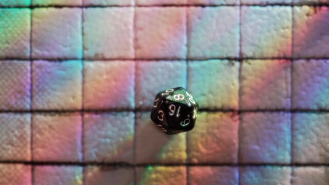 D20 Die Rolled on a Decorated Table for a Tabletop Role-Playing Game Adventure