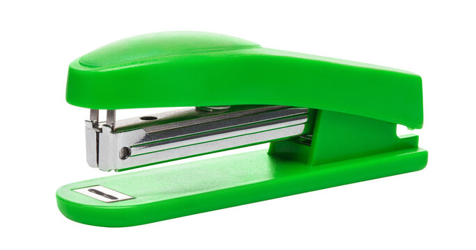 Green stationery stapler for paper binding, isolated on transparent cutout background