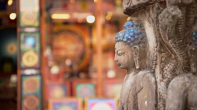 Close Up of Buddhist Buddha Statue at Temple in Kathmandu Nepal, Close Up Detail of Buddhist Stone Statues at a Famous Religious Site for Buddhism Religion