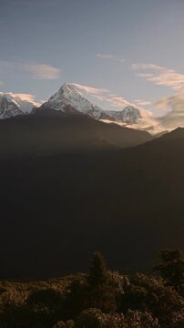 Vertical Himalayas Mountains in Nepal, Sunrise Mountain Scenery Vertical Video for Social Media Instagram Reels and Tiktok, Amazing Landscape of Big Tall High Snowcapped Summits at Poon Hill Viewpoint