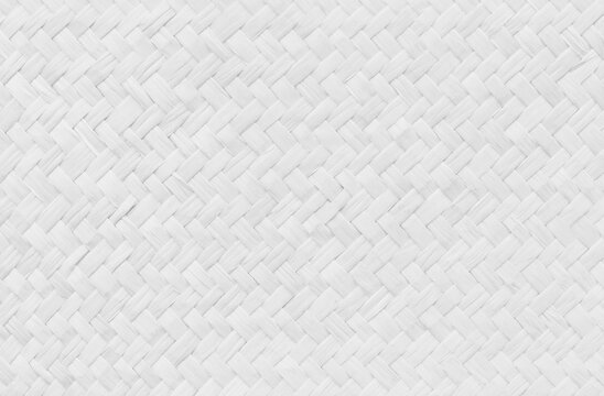 Pattern of white old reed weaving mat with vintage style for background and design art work.