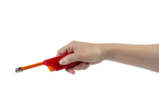 Red gas lighter gun for gas-stove and hand isolated on transparent background.