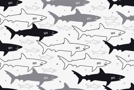 Seamless pattern of cartoon sharks in shades of black and grey swimming on a white background with triangles.