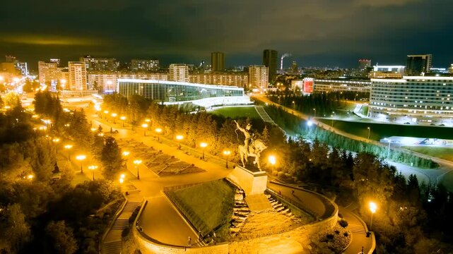 Ufa, Russia. Square named after Salavat Yulaev. Panorama of the city. Night city lights. Drone footage