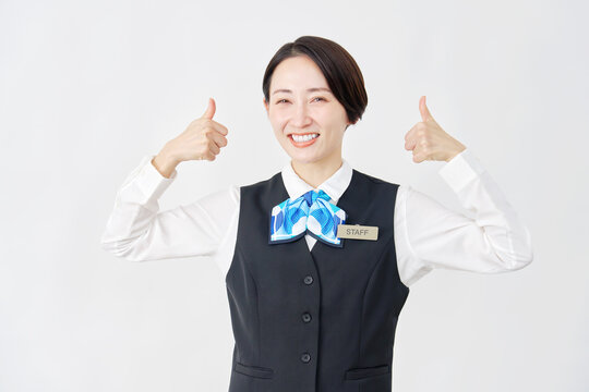 女性スタッフ　受付嬢・銀行員　両手でグッドサイン　白背景　