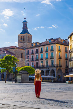 Woman walking in Plaza Mayor of Segovia Spain, travel and exploration concept