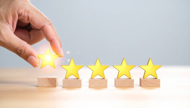 Hand placing glowing star symbolizing excellence and quality