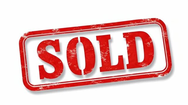 A red grunge rubber stamp with the word sold isolated on a white background