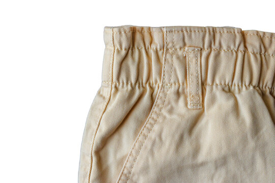 Close-up of a beige shorts waistband with elastic gathering, stitching, and belt loop, isolated as a PNG element on a transparent background.