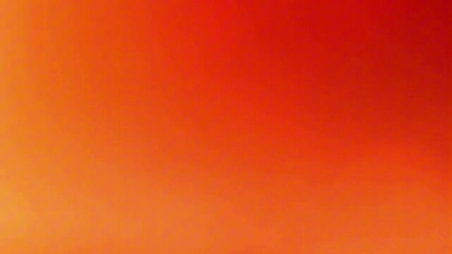 Abstract red and orange smooth gradient background for design wallpaper presentation template