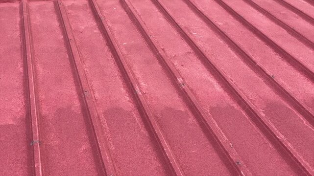 Red corrugated metal roof texture