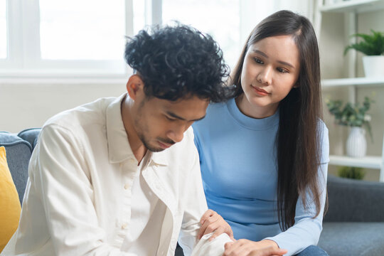 Mental health monitoring and therapy concept. Boyfriend consoling his anxious girlfriend and comforts give her mental support.