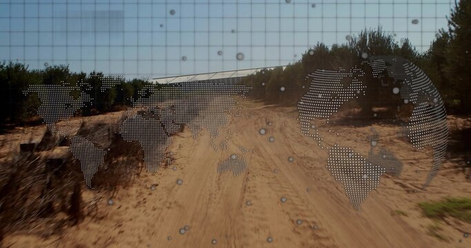 Playback starting, sandy road with dotted world-map overlay moving forward, showing route progress