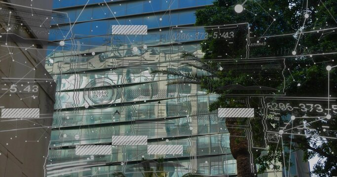 Camera tilting upward starting data overlay glass office tower hosting sliding bars linking nodes