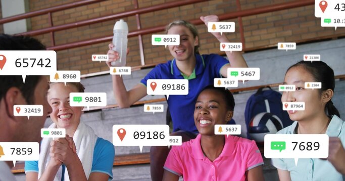 Coach gesturing, badges appearing and multiplying, team cheering, reacting, showing live engagement