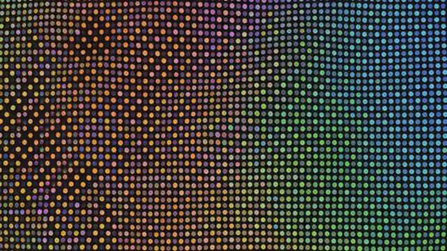 Abstract gradient pixelated dots background with a spectrum of vibrant colors creating a digital design element