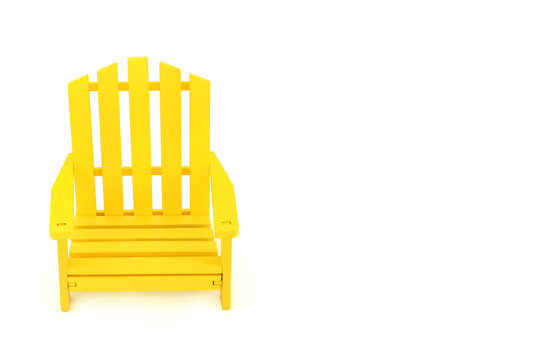 Wooden yellow slatted armchair modern design. Indoor or outdoor patio chair furniture simple classic decor on white background.