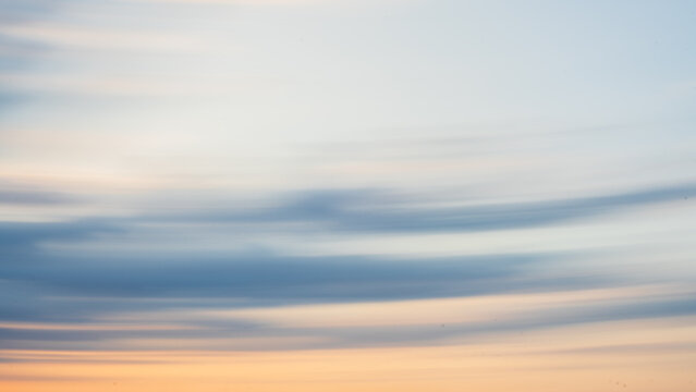 Dreamy sunset ICM abstract background flowing light with sunset colours and soft texture