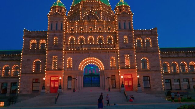 Victoria, BC, Canada &ndash; July 13, 2026: Facade of British Columbia Parliament Buildings illuminated at twilight